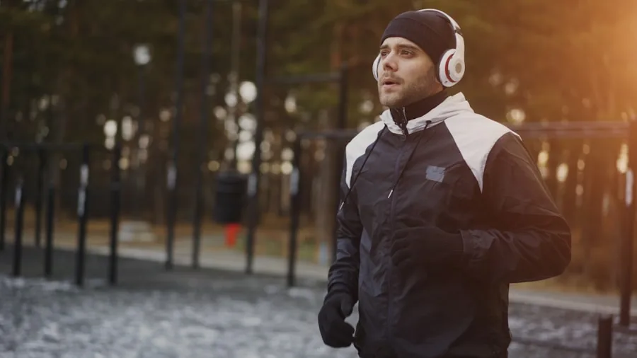 Active jogger adjusting audio settings on wireless earbuds during outdoor run