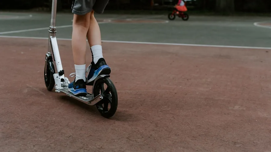 Adult checking scooter specifications before riding outdoors