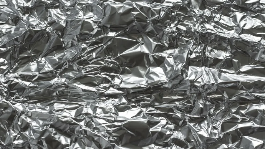 Ant Problems on Your Hummingbird Feeder: What Buyers Should Know 3 aluminum foil wrapped pole