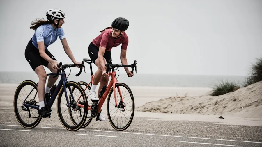 Athlete reviewing cycling performance data and training metrics on outdoor ride