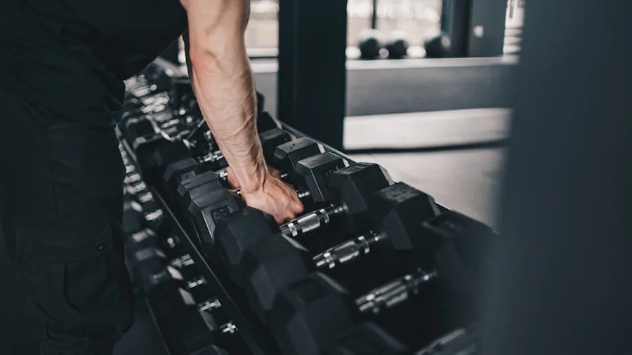 The %product_count% Best Workout Earbuds 5 Athlete wearing earbuds during intense gym workout with weights in background