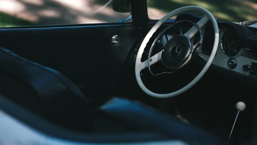 How Car Review Editors Shape Your Buying Decisions 3 car dealer showroom interior