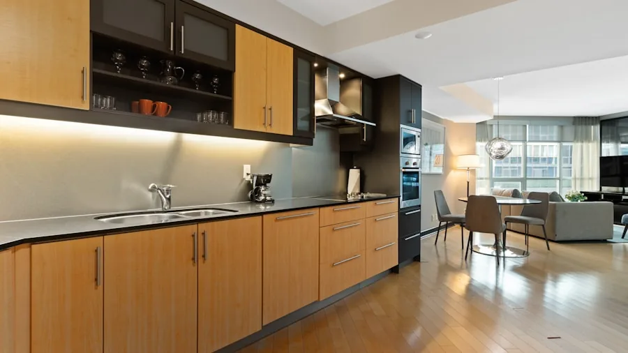 Close-up of a soft-close kitchen cabinet door gently shutting in a contemporary home kitchen