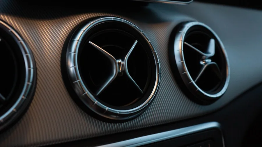 The %product_count% Best Car Air Fresheners 2 Close-up of car air vent with air flowing through dashboard vents during drive