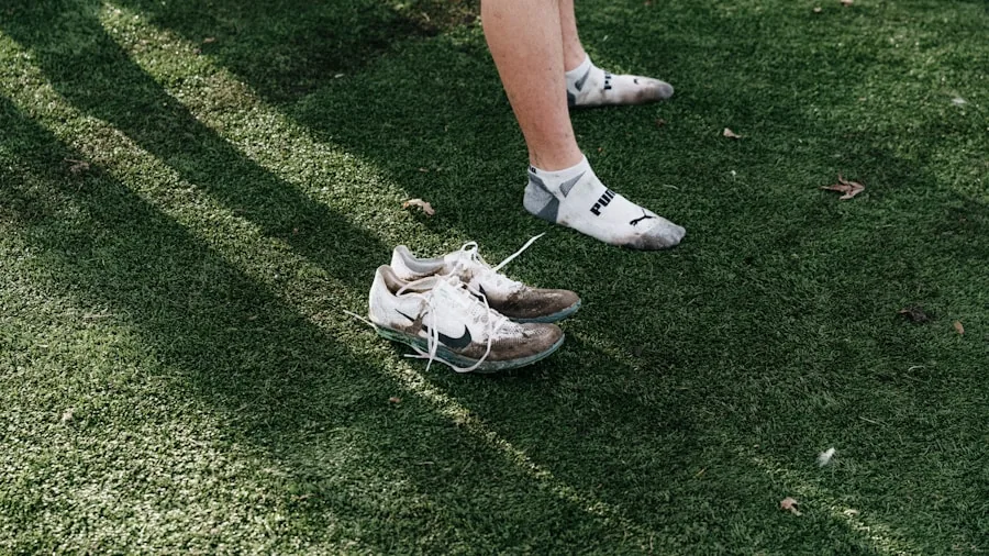 Close-up of football player's cleats on grass field during training, showing shoe durability and construction