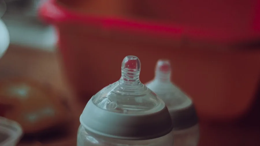 The %product_count% Best Baby Bottles 3 Close-up of infant drinking from bottle during feeding time