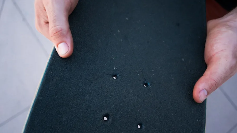 Close-up of skateboarder's feet on grip tape during trick practice