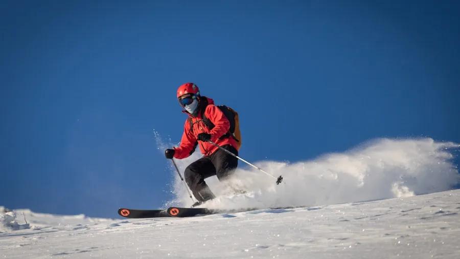 Close-up of skier fitting and adjusting ski goggles on snowy mountain terrain