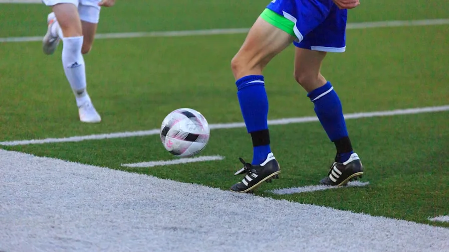 The %product_count% Best Soccer Cleats 2 Close-up of soccer player's cleats on natural grass field during training