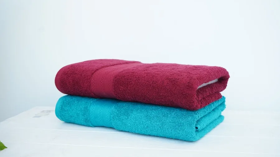 Close-up of soft, fluffy bath towels stacked together showing fabric texture and density