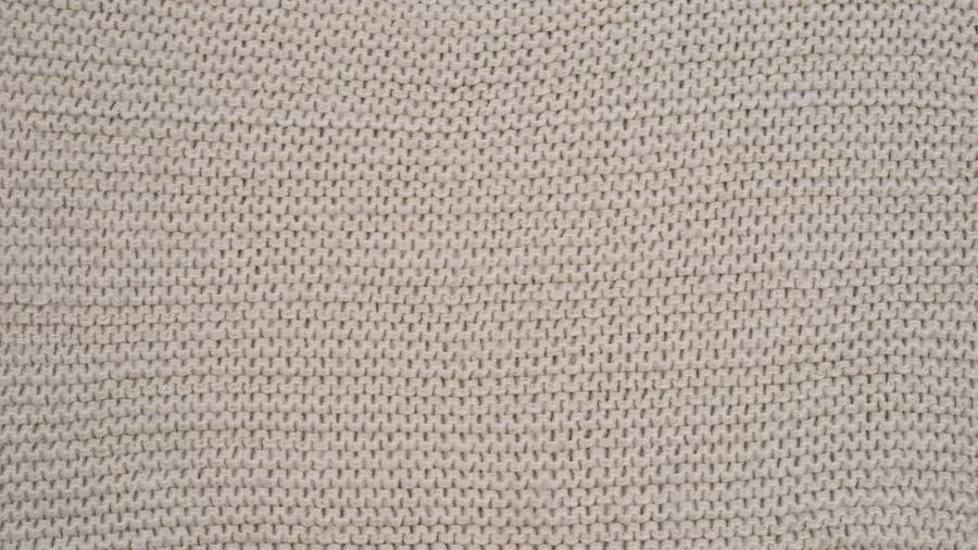 Close-up of soft textile materials showing fabric texture and weave detail for durability assessment