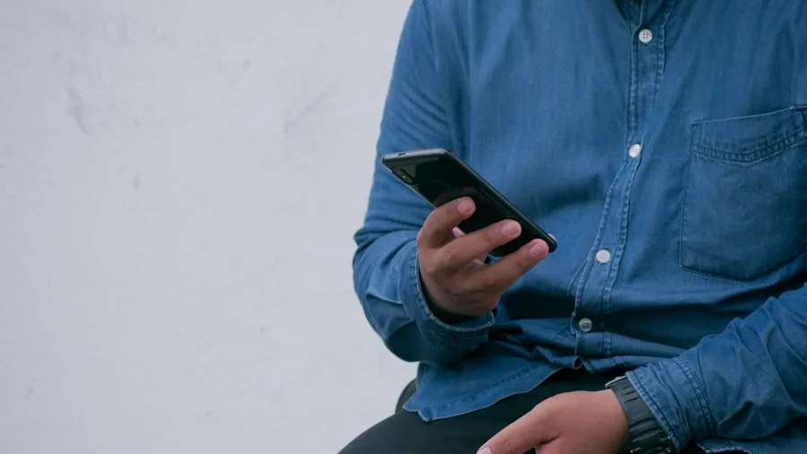 Close-up of someone inspecting a smartphone screen in natural light