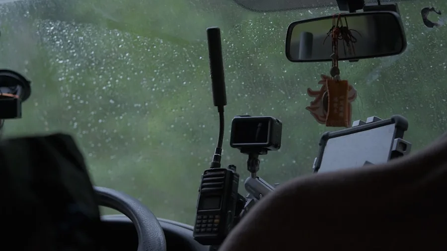Close-up of suction cup attachment on car windshield during daytime driving