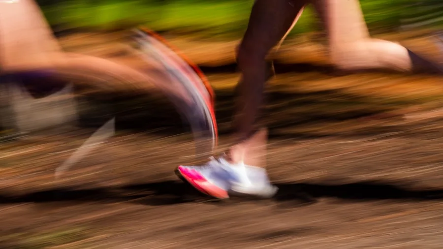 Close-up of volleyball player's feet during dynamic lateral movement and court positioning