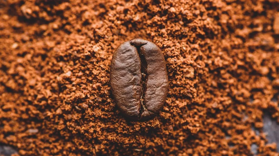 Close-up view of ground coffee particles showing uniform texture and consistency during brewing preparation