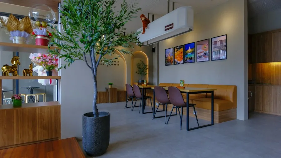 Specialty Coffee Shop Design Takes a Bold Turn in Barcelona with New Layout Strategy 3 coffee shop seating area comfortable