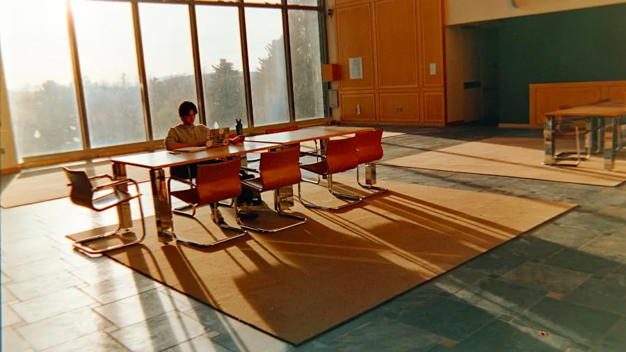 The %product_count% Best Laptops for Colleges 4 College student working on laptop in library during daytime hours with natural lighting