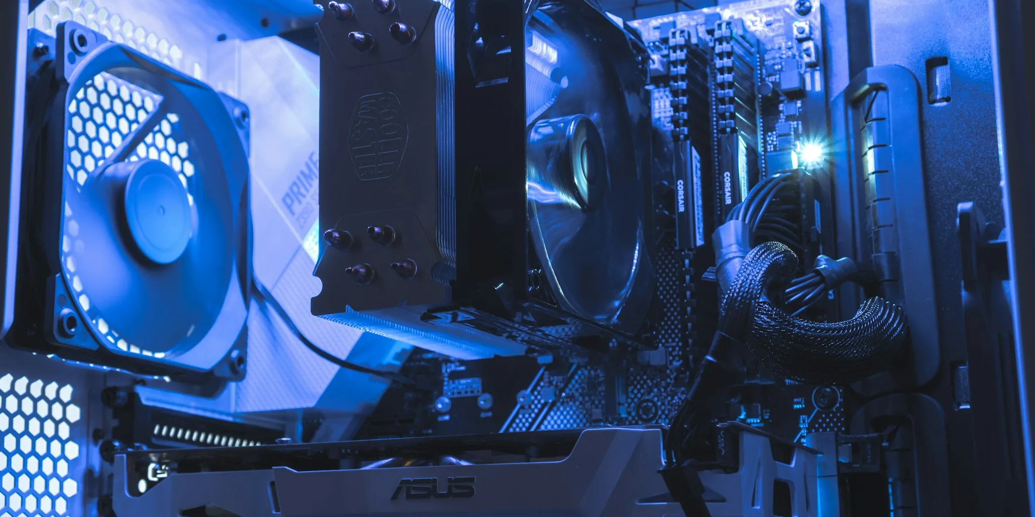 Computer enthusiast applying thermal paste to CPU during PC build and upgrade process