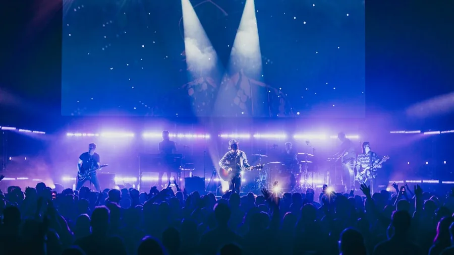 Seven Major Streaming Releases This Weekend: What TV Buyers Should Know 2 concert performance on large screen display