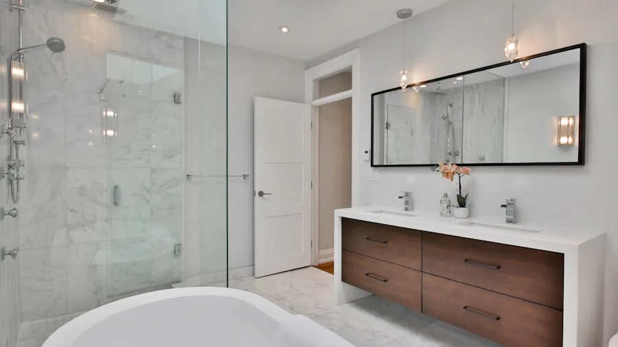 The 13 Best Shower Heads 3 Contemporary bathroom with rainfall showerhead and chrome fixtures in bright, steamy shower environment