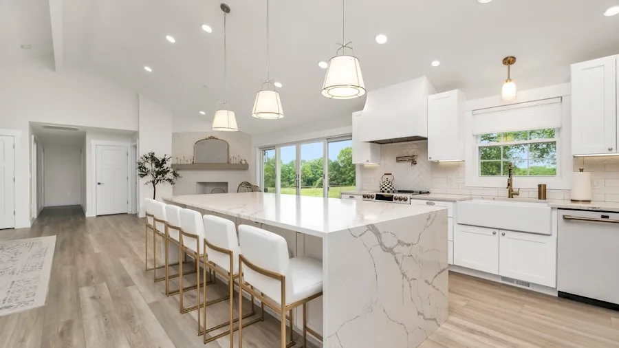 Contemporary kitchen interior with natural lighting and modern appliances, representing energy-conscious home design
