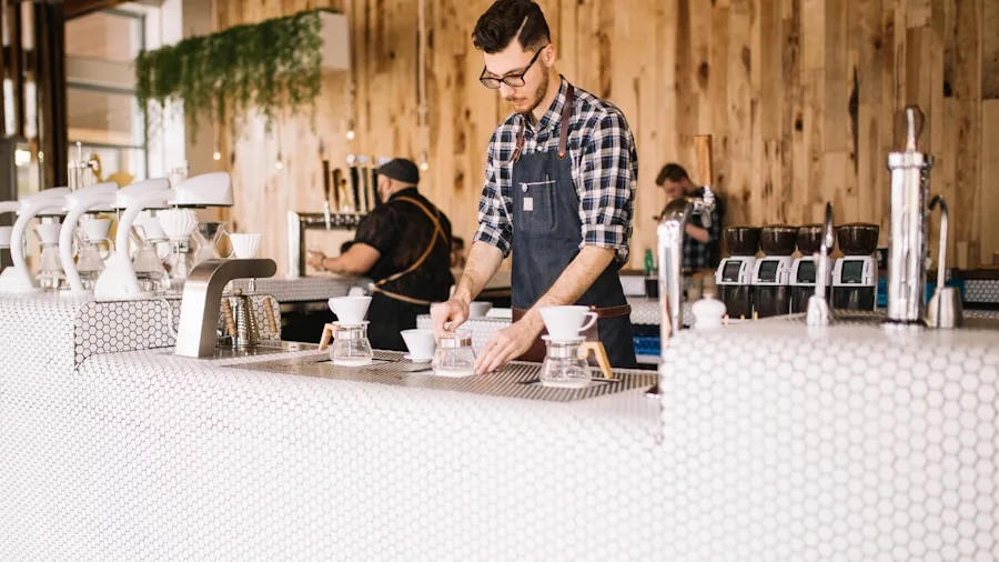 New Coffee Shop in India Shows Why Cafe Design Matters for Shoppers 2 curved coffee bar with barista