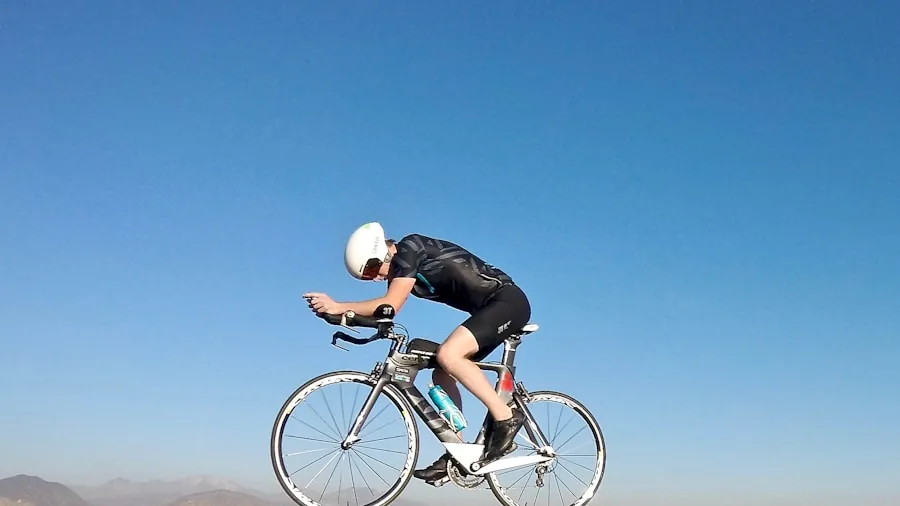 The %product_count% Best Road Bikes 5 Cyclist adjusting road bike seat height for proper fit and comfort