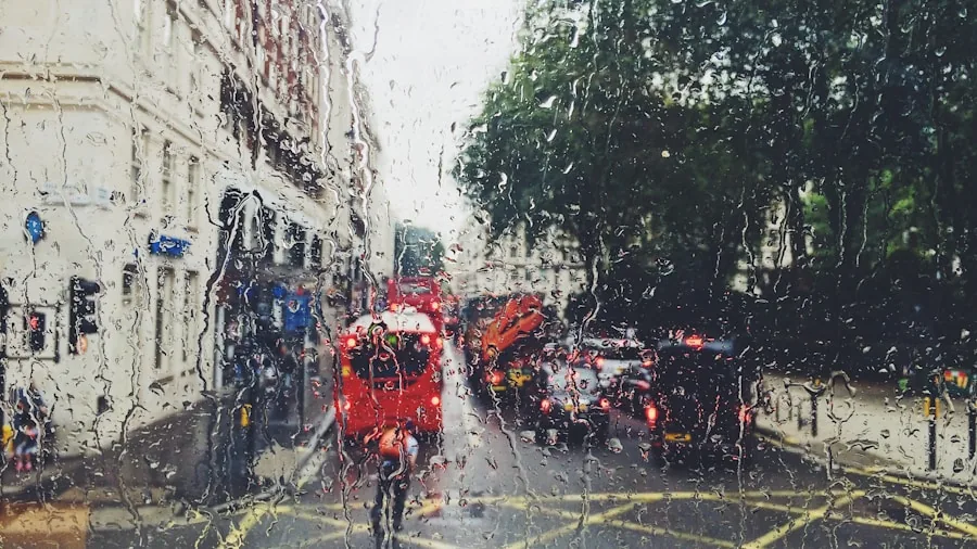 Cyclist riding bike in heavy rain on wet road during downpour