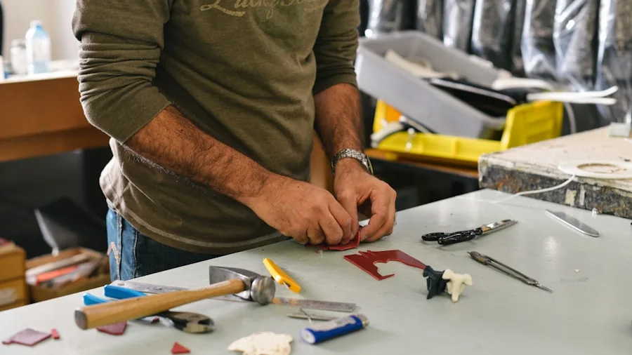 DIY enthusiast using heat tool on craft project at workbench with materials