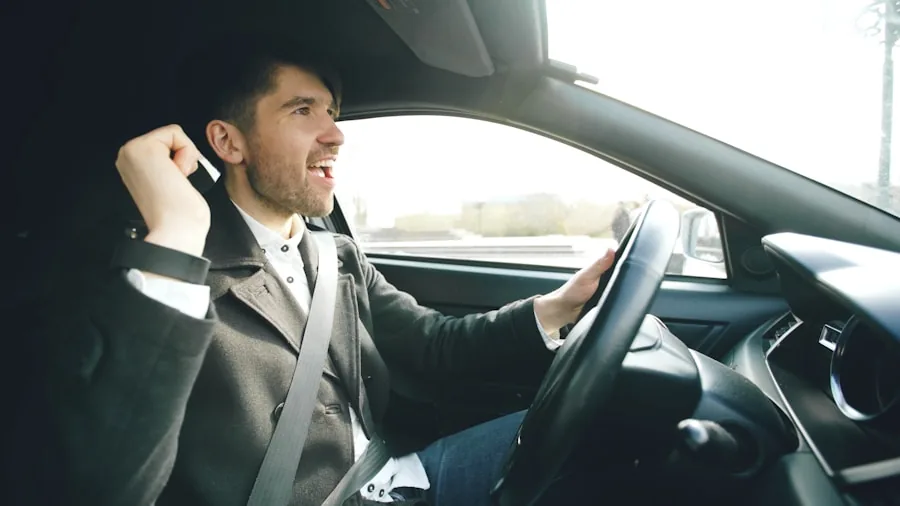 Driver listening to music with eyes closed, experiencing high-quality car audio sound