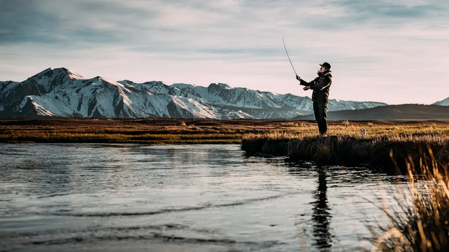 The %product_count% Best Fishing Rods 3 Experienced fisherman casting spinning rod from boat on calm lake during golden hour