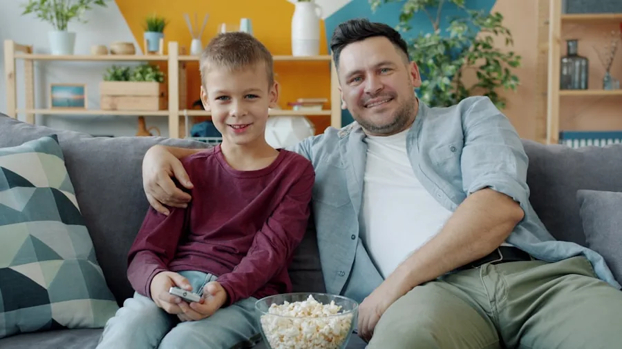 The %product_count% Best TVs 6 Family enjoying movie night in comfortable living room with ambient lighting
