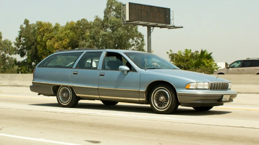 Sedan Sales Surge in 2024: What Buyers Should Know 2 family highway driving sedan