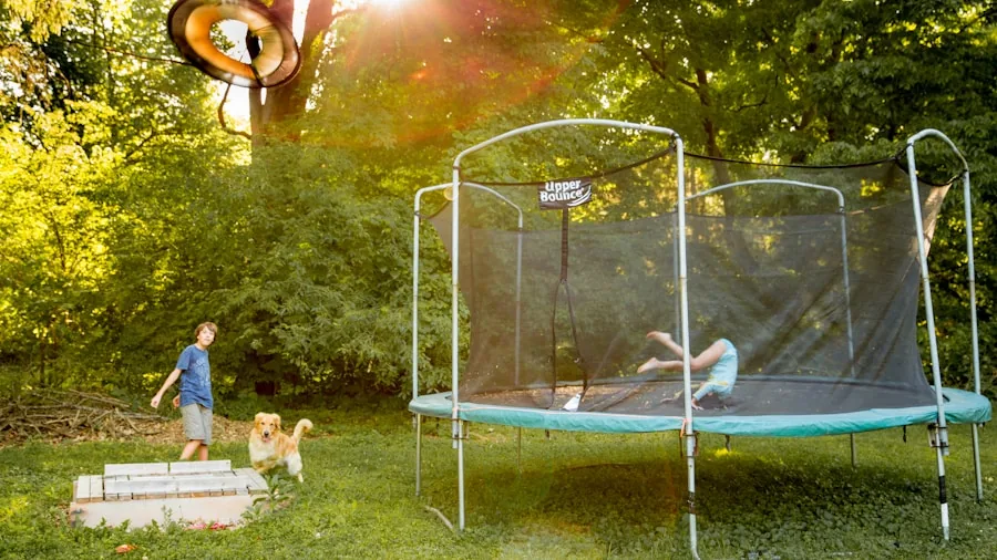 Family members enjoying outdoor trampoline activity in sunny backyard setting
