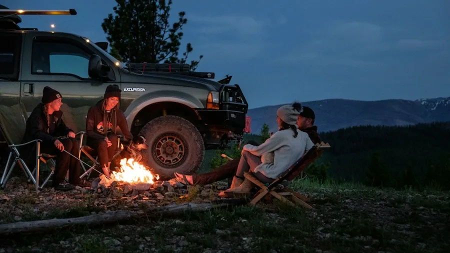 Ford Fathom EV Truck Patent Shows Built-In TV Shelf for Outdoor Tailgating 3 family outdoor movie night camping