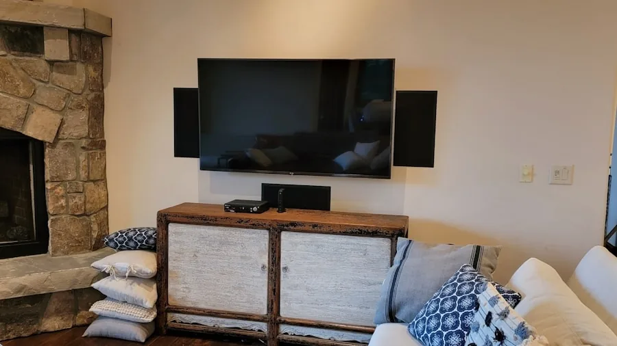 Family relaxing in living room experiencing immersive audio and entertainment together