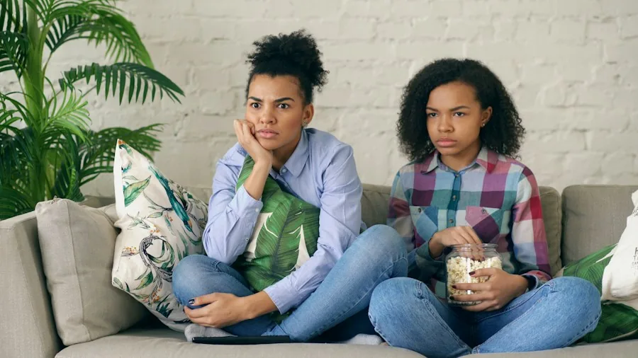 New Movies and Shows Available This Weekend: What Shoppers Should Know 3 family watching streaming movies
