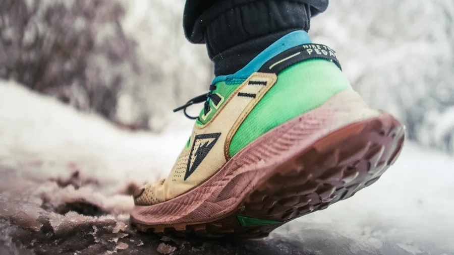 Female hiker navigating wet rocky terrain with proper footwear traction