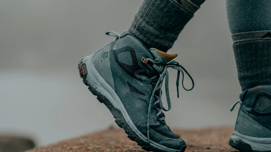 The %product_count% Best Hiking Shoes for Women 5 Female hiker walking on mountain trail wearing lightweight hiking shoes