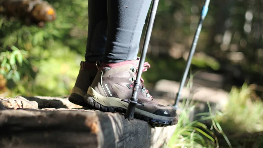 The %product_count% Best Hiking Shoes for Women 3 Female hiker's boot gripping rocky mountain terrain during outdoor trek