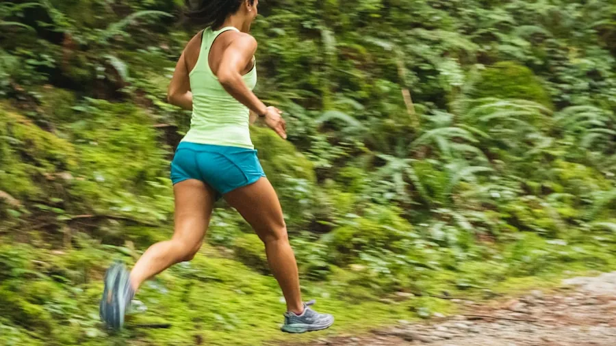 female runner in workout shorts
