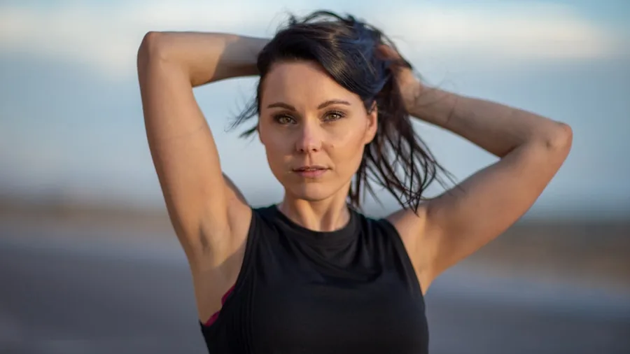 The %product_count% Best Sports Bras for Running 3 Female runner jogging outdoors with visible perspiration, demonstrating moisture management during exercise