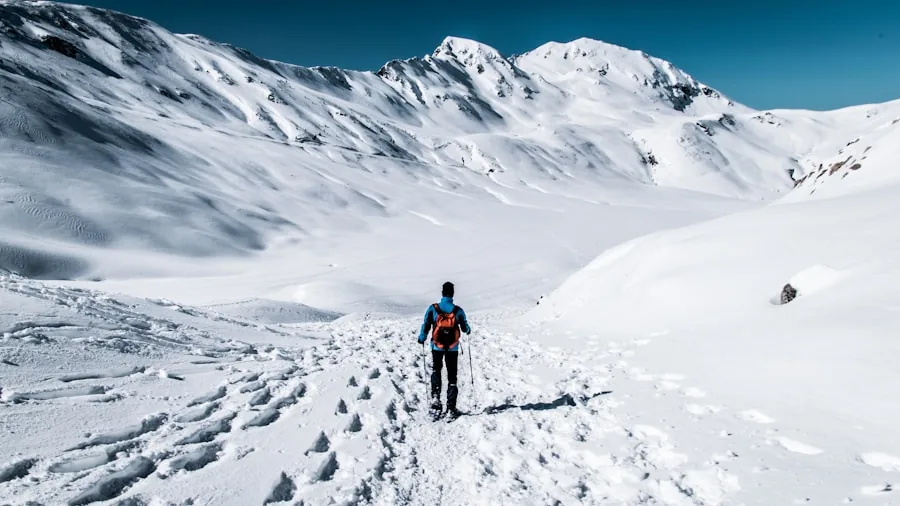 The %product_count% Best Ski Jackets for Women 2 Female skier navigating snowy mountain slopes in winter conditions