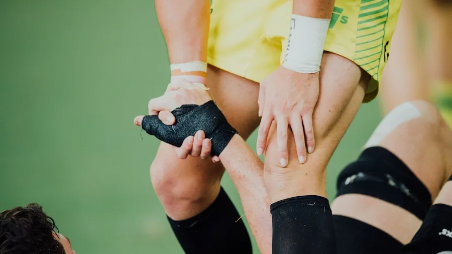 Football player demonstrating ankle stability during lateral movement and directional change on field