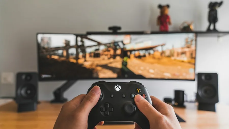 gamer at computer desk