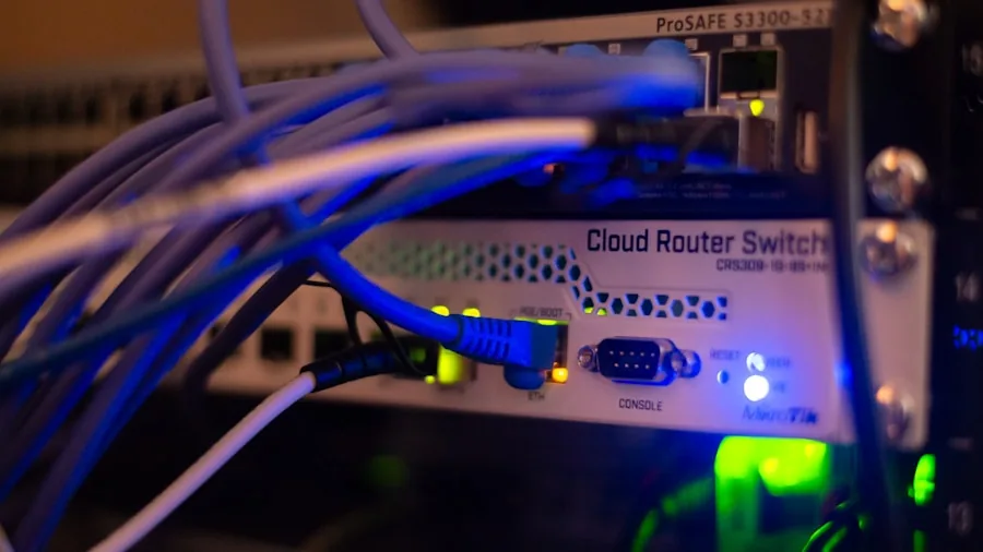 Gamer at desk with wired network connection for competitive online play