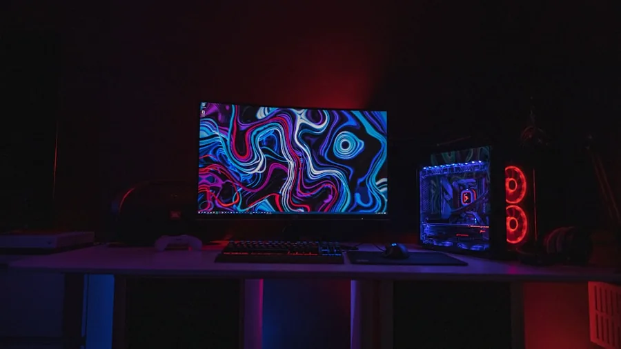 Gamer focused on monitor display showing vivid colors during gameplay session