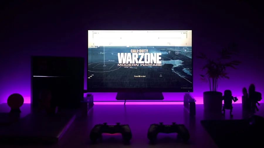 Gaming setup with multiple consoles and controllers on desk in natural light