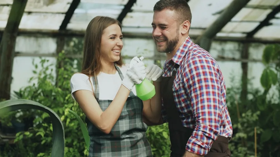 The %product_count% Best Gardening Gloves 4 Gardener examining different work gloves while planning garden tasks outdoors