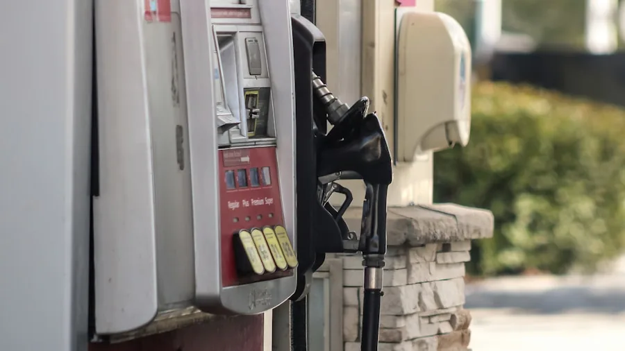 EV vs Hybrid vs Gas Car for Road Trips: Real World Comparison and Costs 3 gas pump fuel stop